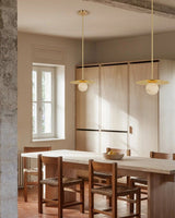 Alabaster Globes LED Disc Pendant Light in Lacquered Brass/Black Stainless Frame